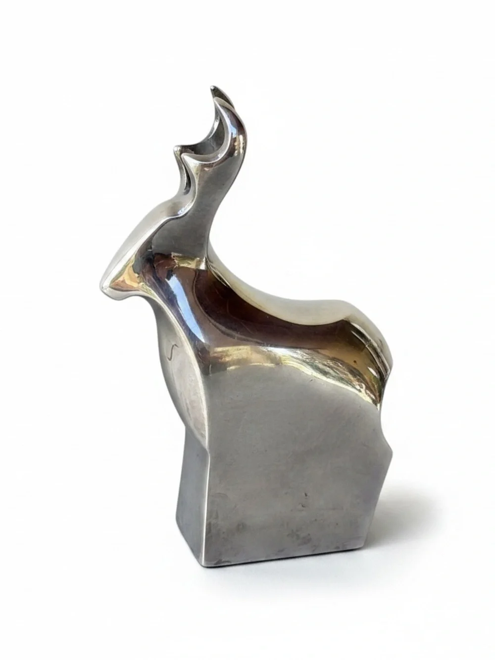 Vintage Dansk Designs Japan silver-plated reindeer figurines.